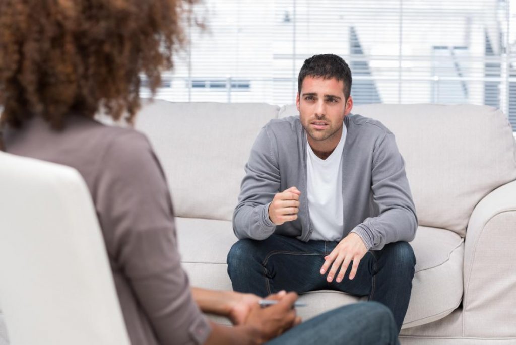 man-discussing-issues-with-a-therapist