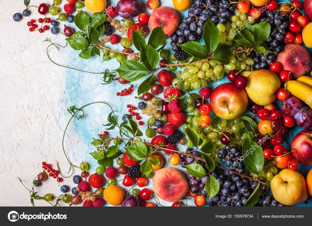 Still life of various fruits and berries . Top view